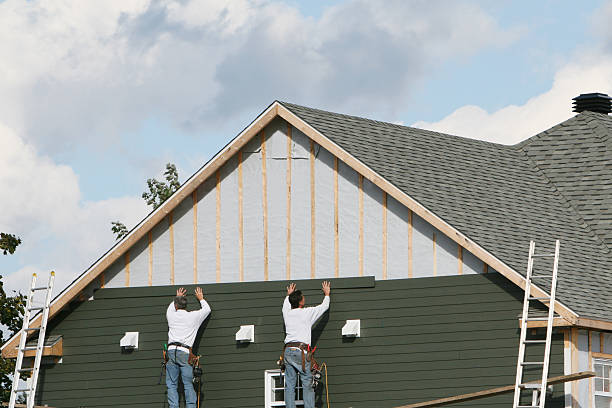 Professional Siding technician working in Liberty, IN